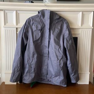 Under armor jacket. Water resistant with liner